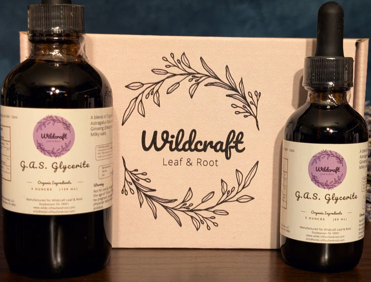 Two bottles of Wildcraft G.A.S. Glycerite with a branded box in the background.